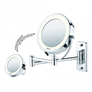 Espejo de maquillaje cromado delante de la pared de ladrillo con marco en  blanco extreme closeup